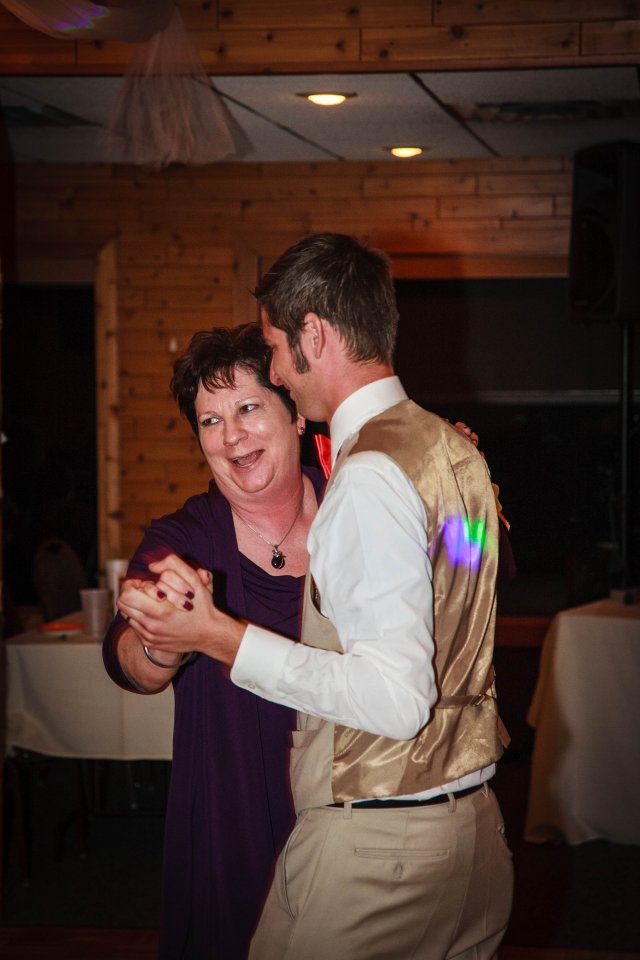 Mother and groom dance